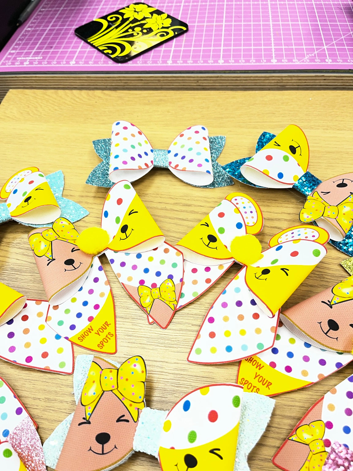 Handmade Pudsey and Blush hair bows in assorted glitter colours